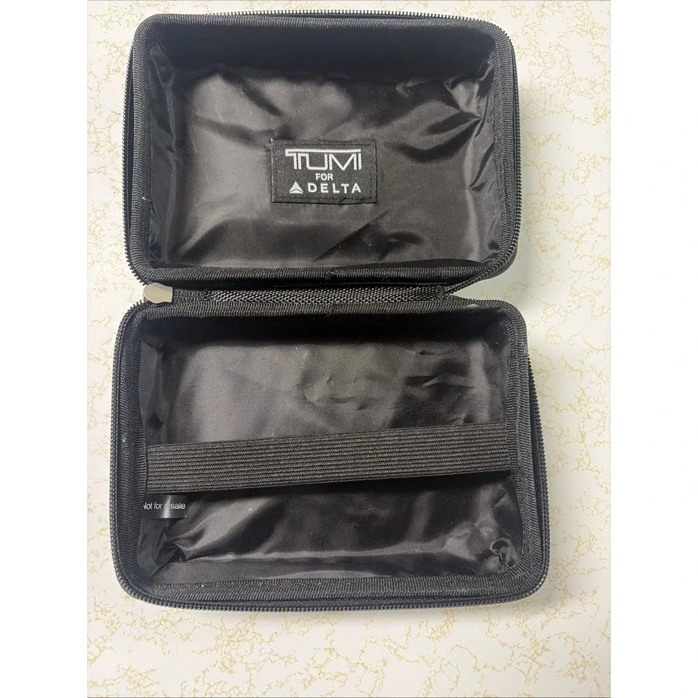 TUMI For Delta Silver Gray Hard Shell Cosmetic Toiletries Zip Travel Case